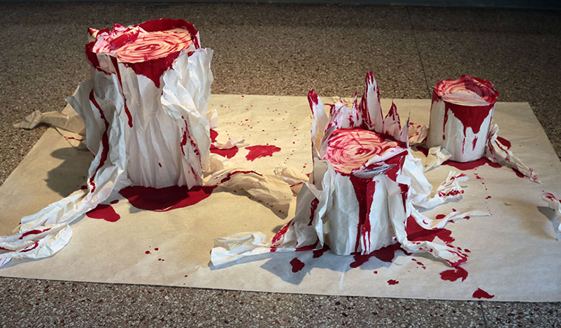 A sculpture of bleeding tree stumps