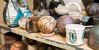 A shelf of pottery