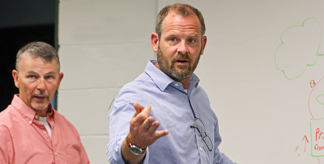 Rogan Stoops teaching a graduate class