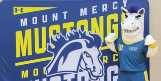 Mount Mercy students posing with Mustang Sally