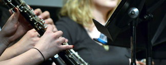 Student playing an instrument.