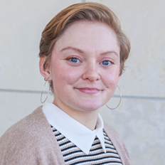 Elyse Keeffer smiling into the camera