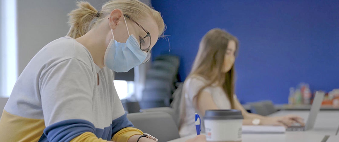 students taking notes in class