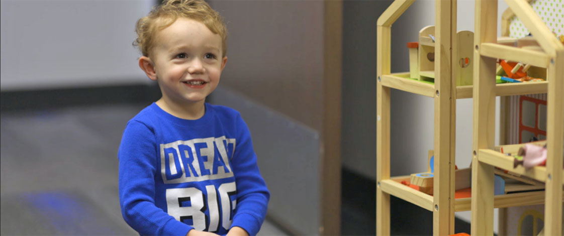 A young boy doing play therapy at the Olson Marriage and Family Therapy Clinic