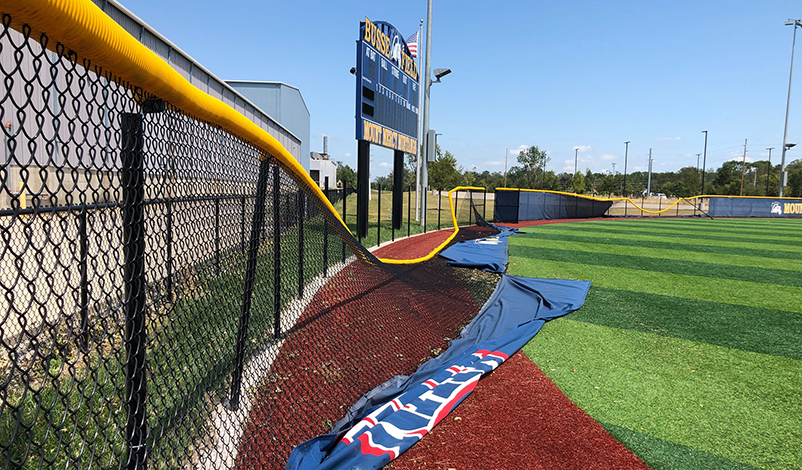 Fallen fence line at Busse Field