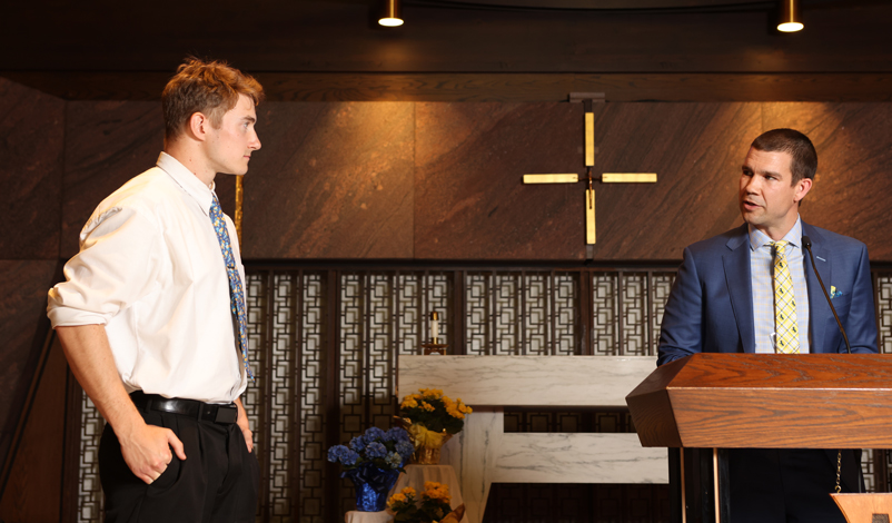 Nate Klein presenting Andrew Lorig with the president's award