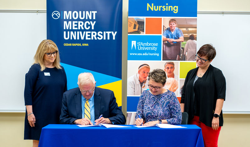 mount mercy st ambrose articulation agreement signing