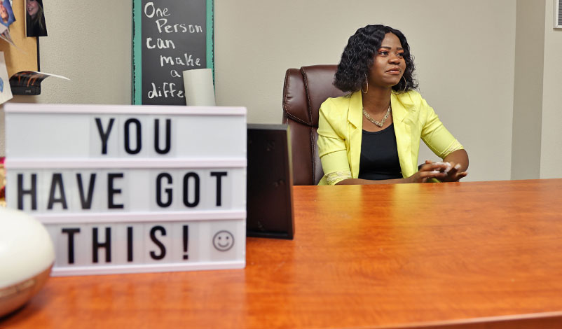 Frankline Tshombe sitting in her office at Families First Counseling