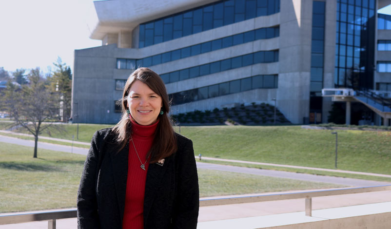 Tammy Koolbeck posing outside Stephens Auditorium.