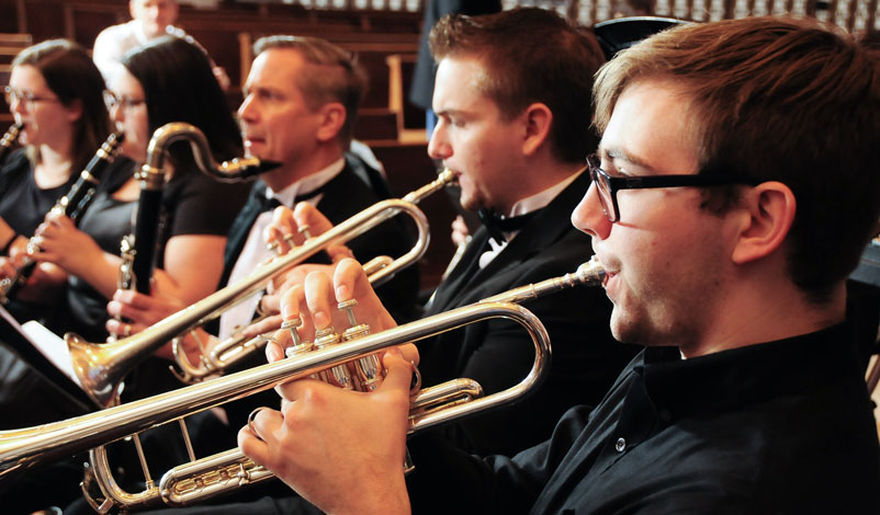 Students playing instruments.