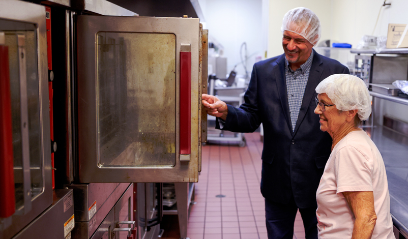 mike barnhart with cooking oven