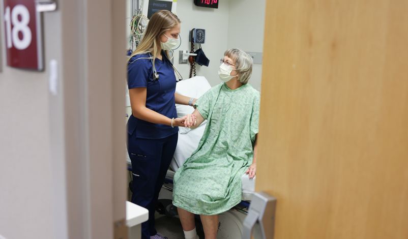 becca talking with a patient