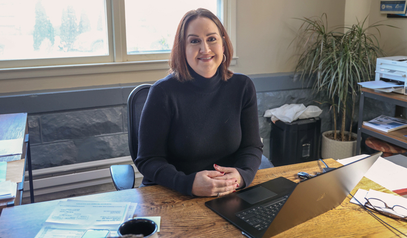 Amy Guardado sitting in her office