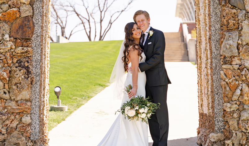 Katie and Michael posing on campus