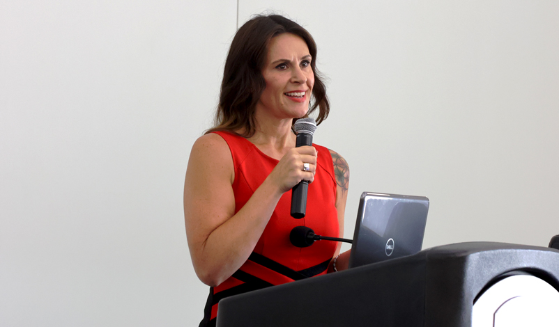 Stefanie Munsterman speaking at a women in leadership meeting at mount mercy university grad center