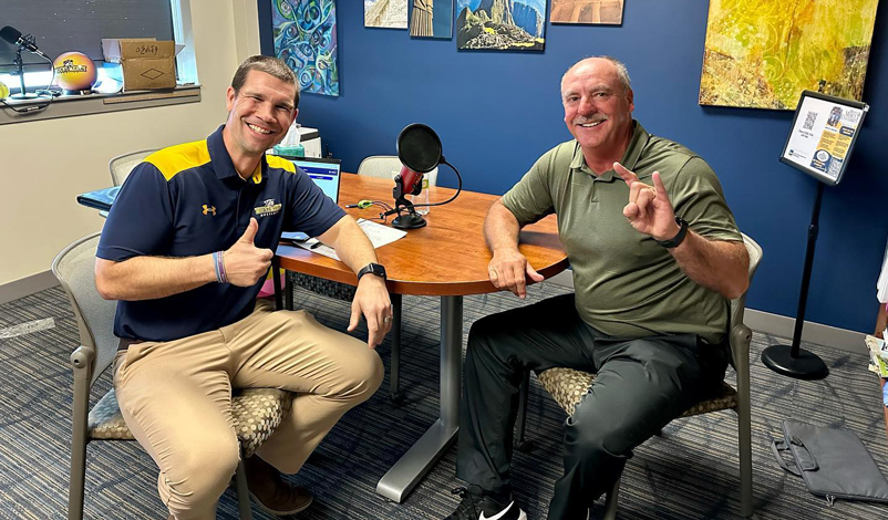 Mike White '89 in an admissions office with Nate Klein