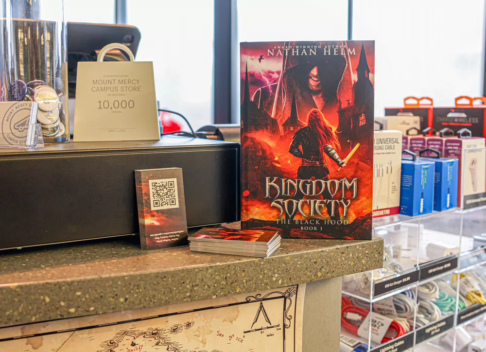 Nathan Helm's book, Kingdom Society, in the Mount Mercy campus bookstore