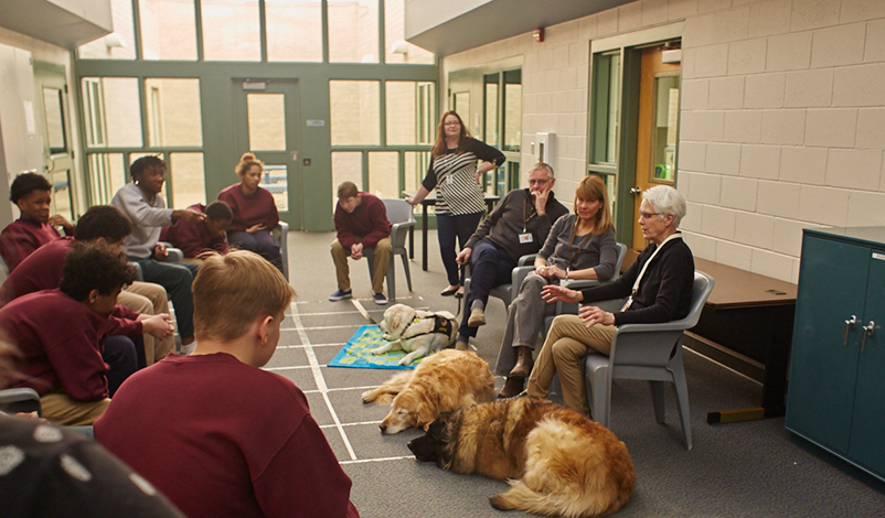 One diversion program group talks as a group after their small group breakout.