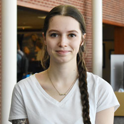 Tonya Kramer, posing for a photo in the university center commons